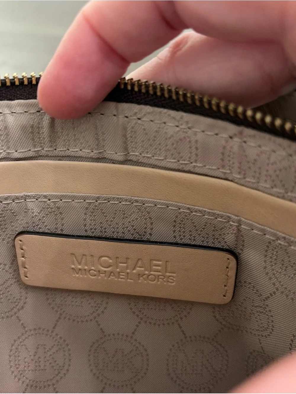 Michael Kors Brown and Tan MK Logo Wristlet with Gold Plate